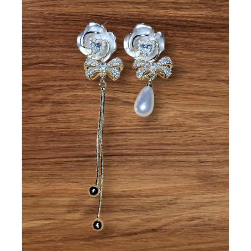 Boucles d'oreilles dépareillées