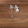 Boucles d'oreilles dépareillées