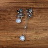 Boucles d'oreilles dépareillées