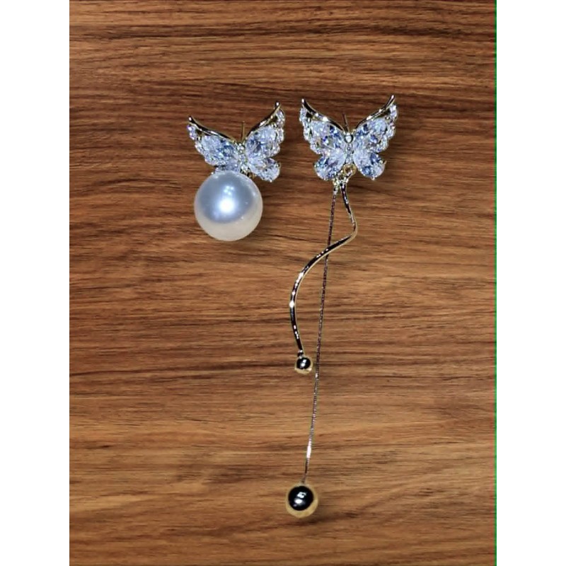 Boucles d'oreilles dépareillées