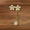 Boucles d'oreilles dépareillées