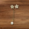 Boucles d'oreilles dépareillées