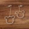 Boucles d'oreilles dépareillées