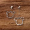 Boucles d'oreilles dépareillées